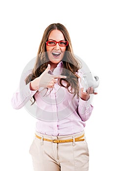 Young beautiful woman standing with piggy bank