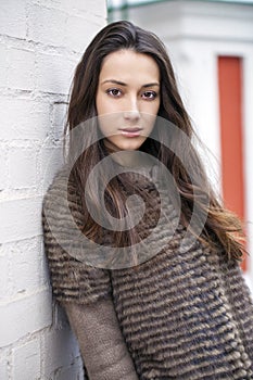 Young beautiful woman in stylish mink coat