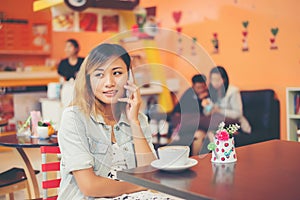 Young beautiful woman talking phone at coffee shop look so happy