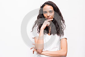 Young beautiful woman thinking looking to the side at blank copy space, isolated over white background