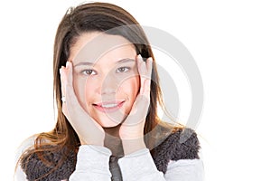 Young beautiful woman touching her natural face isolated on white background