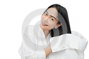 young beautiful woman in towel drying her hair with a towel after swimming