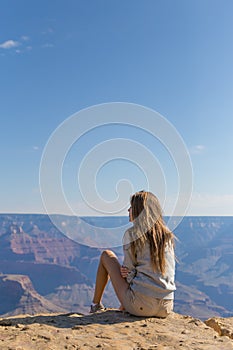 Young beautiful woman traveling, Grand Canyon, USA