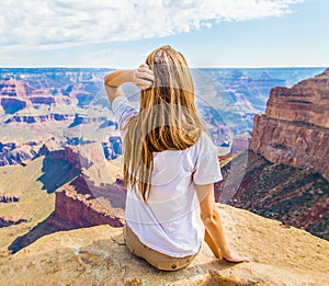 Young beautiful woman traveling, Grand Canyon, USA