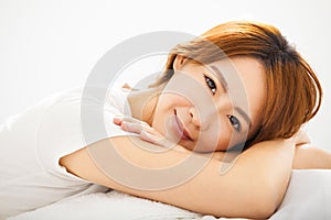 young beautiful Woman Waking Up In Bed