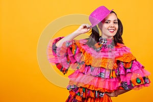 Young beautiful woman wearing a mascarade latino costume