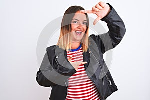 Young beautiful woman wearing striped shirt and jacket over isolated white background smiling making frame with hands and fingers