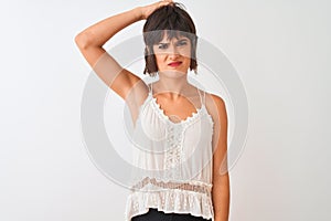 Young beautiful woman wearing summer casual t-shirt standing over isolated white background confuse and wonder about question