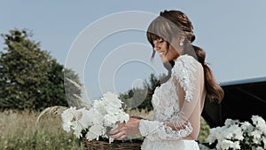 Young Beautiful Woman In Wedding Dress Posing Near Vintage Car.