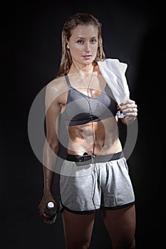 Young beautiful woman wet with sweat