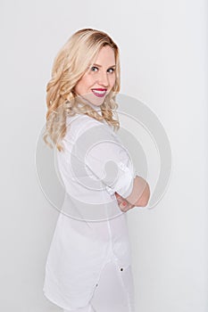 Young beautiful woman on white background