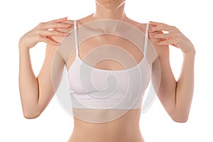 Young beautiful woman in white t-shirt top bra hands on shoulders beauty health sports exercise