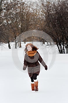 Young beautiful woman in winter