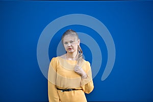 Young beautiful woman in yellow dress