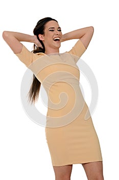 Young beautiful woman in yellow dress laughing