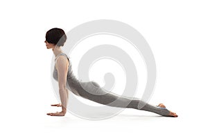 Young beautiful woman yoga posing. isolated