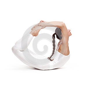 Young beautiful woman yoga posing. isolated