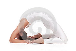 Young beautiful woman yoga posing. isolated