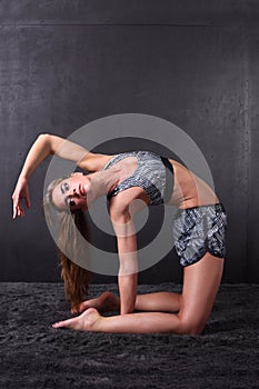 Young beautiful woman yoga posing