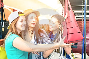 Young beautiful women girlfriends at flea market