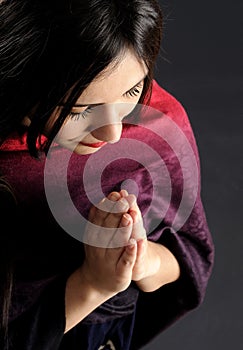 Young and beautiful women praying