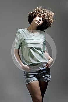 Young beautifull model with curly hair