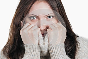 Young beautifull woman in big warm sweater