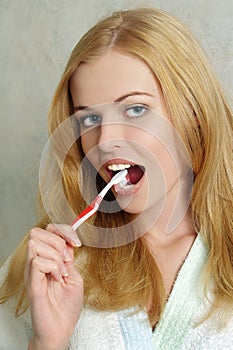 Young beauty woman clean teeth tooth-brush