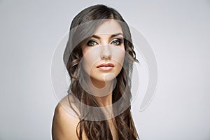 Young beauty woman face close up portrait. Female model with long hair