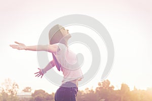 Young beauty woman happy relaxing smile in summer sunset sky out