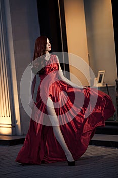 Young Beauty Woman In Red Dress Outdoor