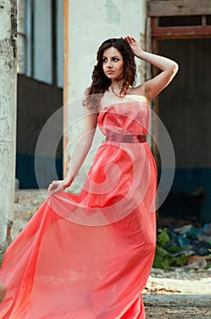 young beauty woman red dress in smoke