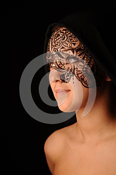 Young beauty woman with tracery on the face