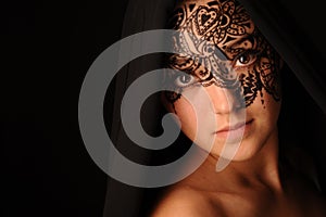 Young beauty woman with tracery on the face