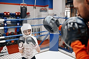 Young begginer of boxing wants to get more fit for sport