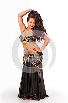 Young belly dancer in black costume