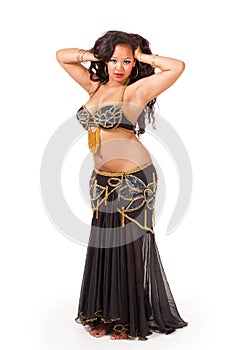 Young belly dancer in black costume