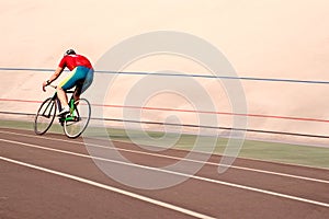 Young biker road bike blurred