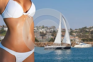 Young bikini clad woman at Marina del Ray