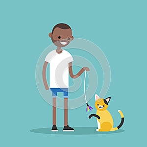 Young black character playing with a cat / flat editable vector