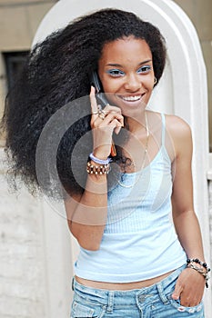 Young black girl on cellphone
