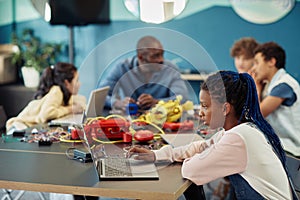 Young Black Girl Programming in Engineering Class