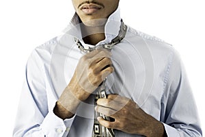 Young black male tying a tie
