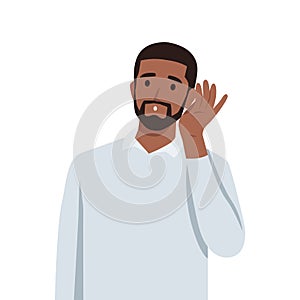 Young black man with hand over ear listening and hearing to rumor or gossip. Deafness concept