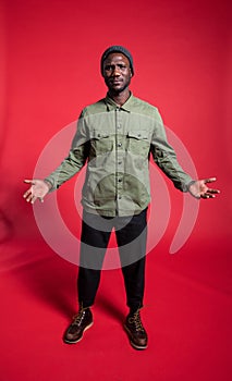 Young Black Man Looking at Camera with Questioning Body Language