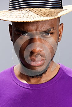 Young black man with serious expression on face