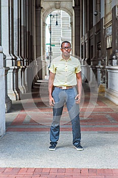 Young black man standing on street in New York City