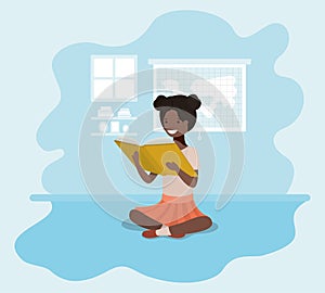 Young black student girl sitting reading book