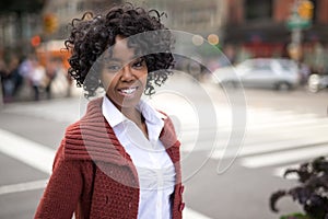 Young black woman in city