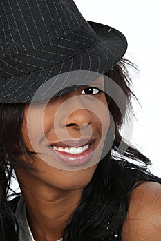 Young Black woman in a hat